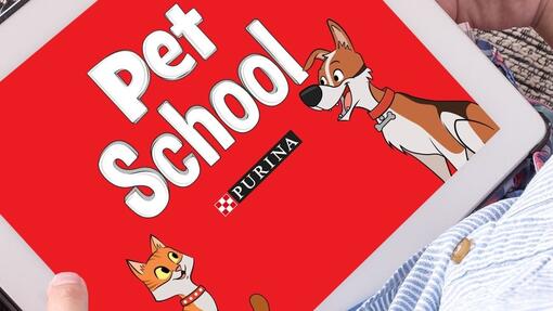 kind met ipad met purina pet school